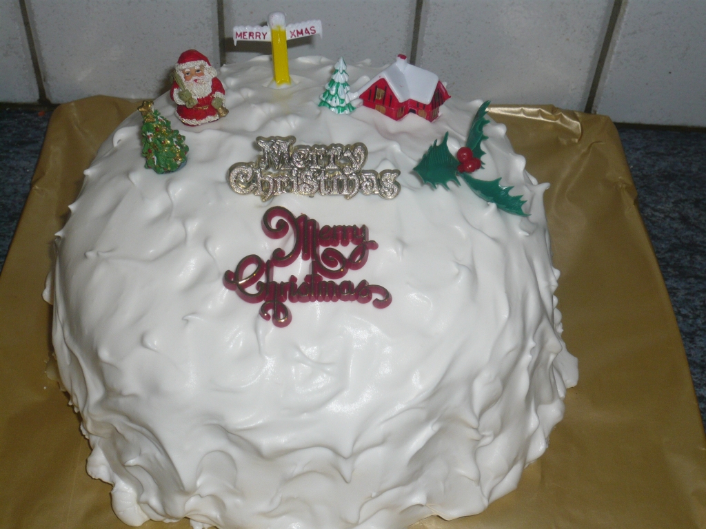 tier round fruit cake with bought decorations