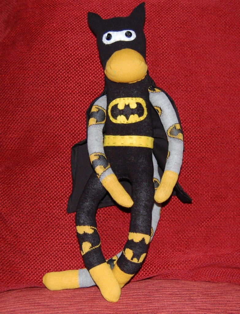 Handmade sock monkey batman by Hours of Fun